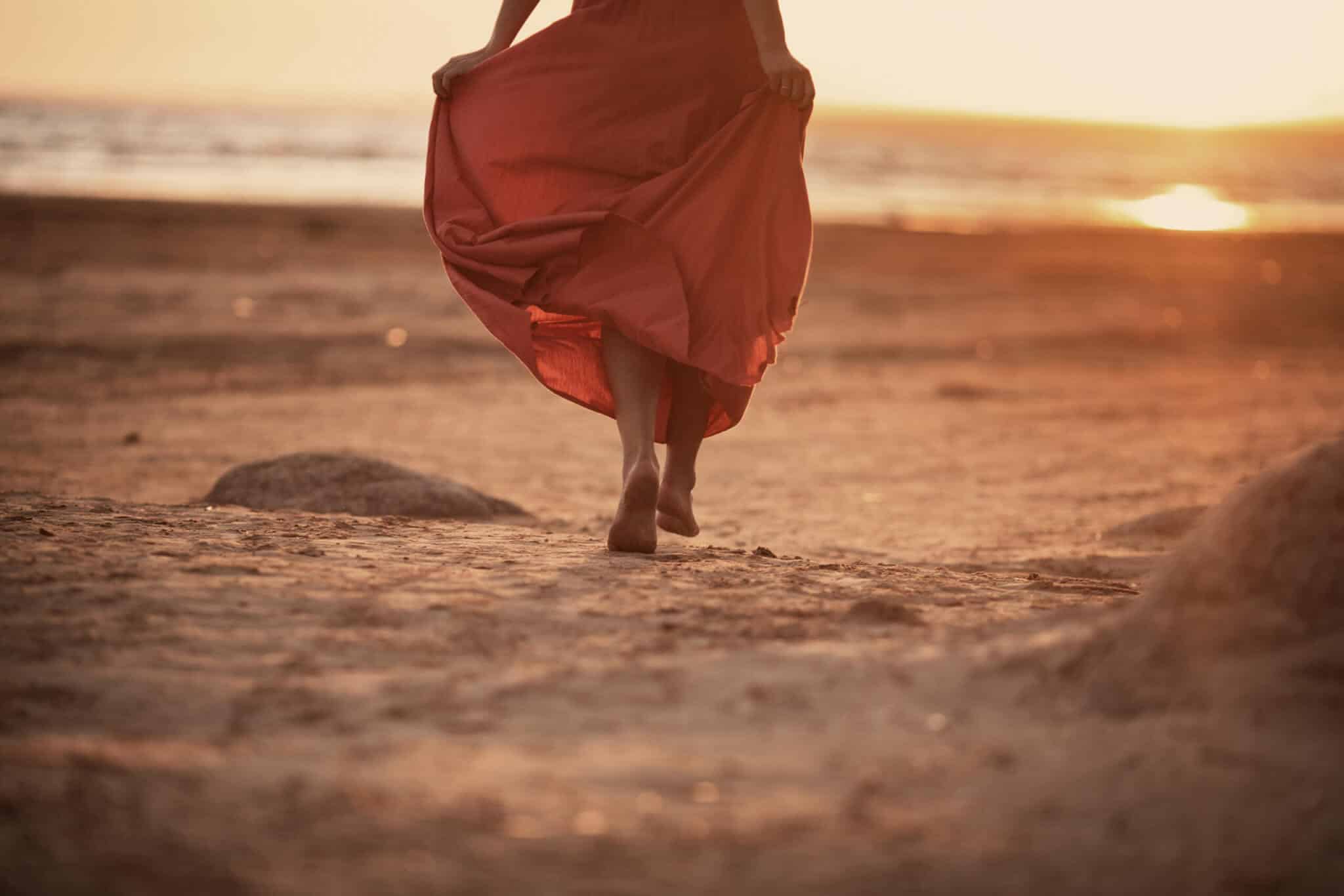 Woman Walking Bare Foot on Beach